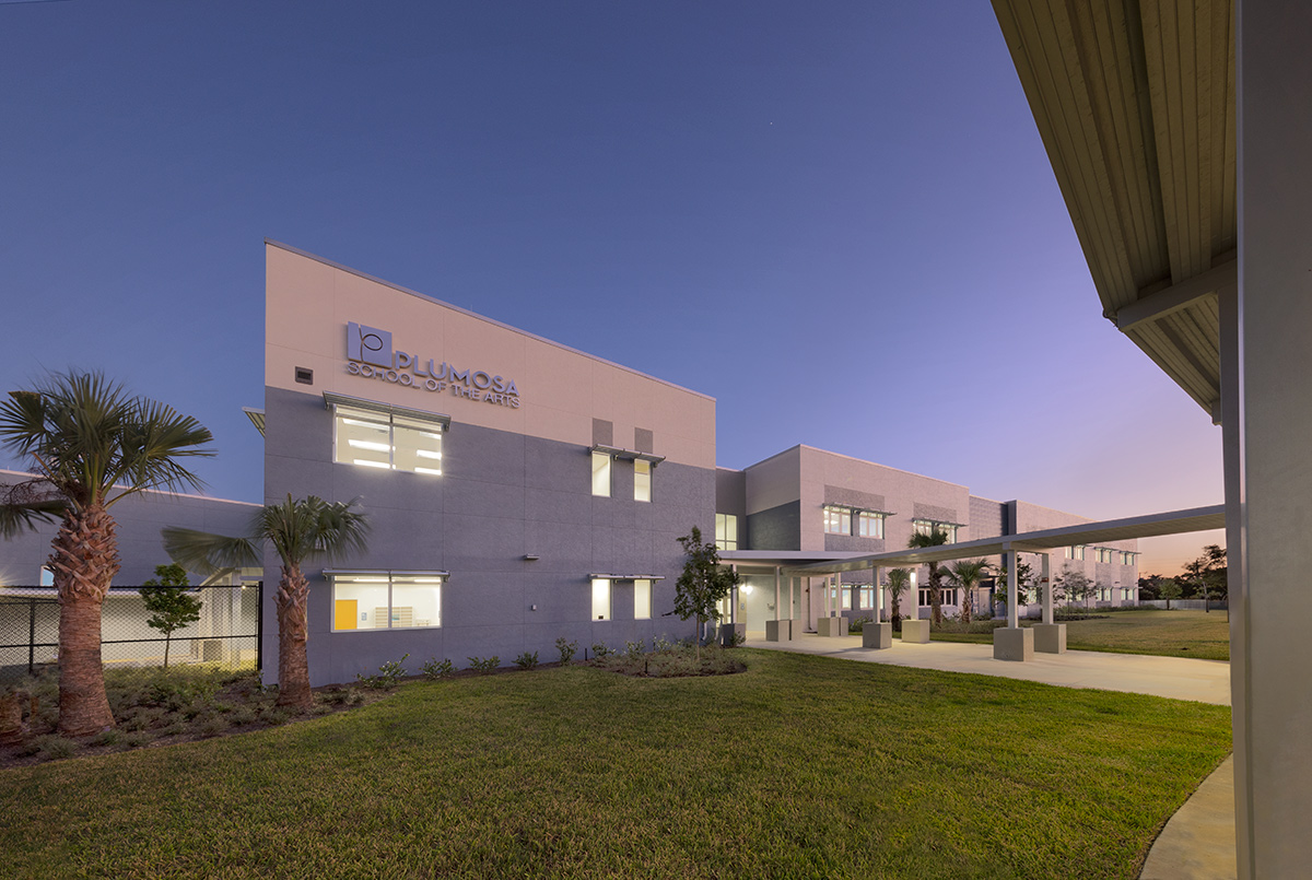 Architectural dusk view of the Plumosa School of the Arts in Delray Beach. FL.